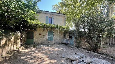 In the heart of the village, real estate complex of two houses to restore: An old house of 30 M2 with its trellis and its vine, with living room-kitchen and 30 M2 upstairs with two bedrooms. To the South, a beautiful barn entirely to restore of 30 M2...