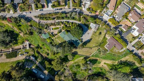 Extraordinary build opportunity. Property consists of 8 parcels across 1.48 acres. Build up to eight homes or one large compound overlooking Las Pulgas Canyon in Pacific Palisades. This land purchase includes plans by renowned architect Tim Barber, f...