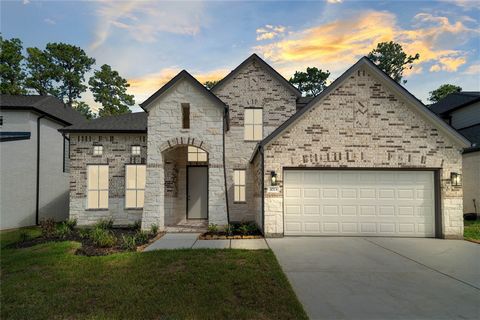 LONG LAKE NEW CONSTRUCTION - Welcome home to 3013 Mesquite Pod Trail located in the community of Barton Creek Ranch and zoned to Conroe ISD. This floor plan features 5 bedrooms, 4 full baths, 1 half bath, Study with French Doors, Brick & Stone Elevat...