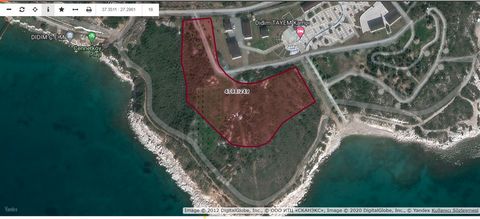 ### Terreno en venta en Didim Altınkum con ubicación frente al mar ### Introducción Didim es uno de los principales centros turísticos de la región del Egeo. La zona de Altınkum, en particular, es famosa por su mar turquesa, sus playas de arena dorad...