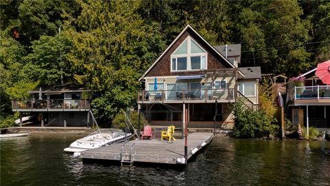 Immerse yourself in the ultimate lakeside retreat w/ this exceptional waterfront property on Shawnigan Lake. Positioned to capture stunning west-facing views, this home offers an unparalleled connection to the lake's serene beauty. Step inside & be g...