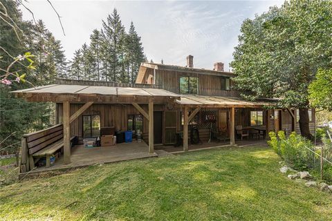 Country life is in store with this charming 9.2 acre family home. This spacious 4-bedroom, 3-bathroom family home offers a serene retreat with plenty of room to grow and explore. The solid construction of this home provides the perfect canvas for rej...