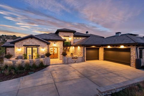 Exceptional and Elegant Chalet Home in the Exclusive and Gated Ravenna Neighborhood. This home has one of the larger lots in Ravenna that captures the Red Rock Formations, Open Space and Picturesque Scenery. Denver's renown Interior Designer Lane Oli...