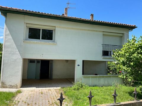 Maison sur sous sol avec jardin