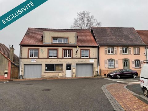 Immeuble : appartement + bureaux + hall stockage