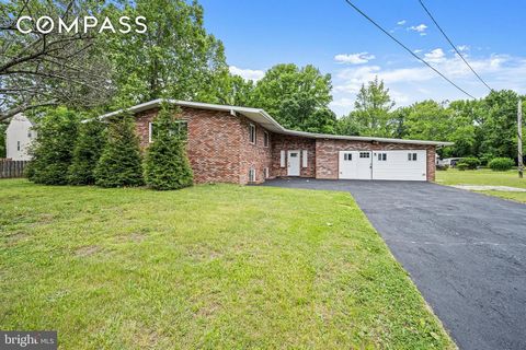 Welcome to your forever home! This beautifully updated 5-bedroom, 3-bath brick split-level is situated on a spacious, flat lot with a double-wide driveway and abundant curb appeal. Enter into a bright, modern vestibule that opens to the upper and low...