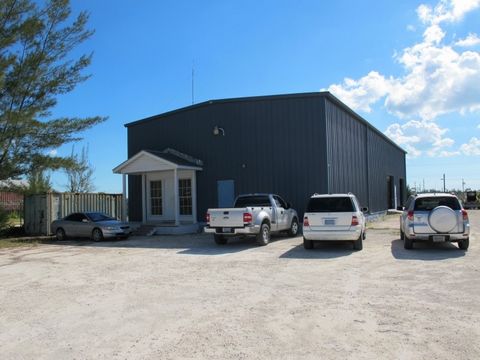Located in West Nassau, this warehouse and office building houses a reception area, conference room, five offices, four work stations and storage room. It also has a full kitchen and male and female bathrooms along with 2 five ton a/c units. All furn...