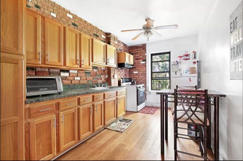 36 Hampton Place is an excellent four-story townhouse with multi-family living space. While units 1 and 3 are currently rented, this home offers a popular dual entrance (2-side abutted), quiet living, commodious bedrooms, numerous closets throughout,...