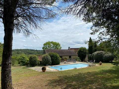 Beautiful ensemble composed of a main house, a barn, a tennis court and a swimming pool, in a superb quiet environment with breathtaking views over 9.6 hectares of land. The main house offers on the ground ground floor, a renovated kitchen, a large d...