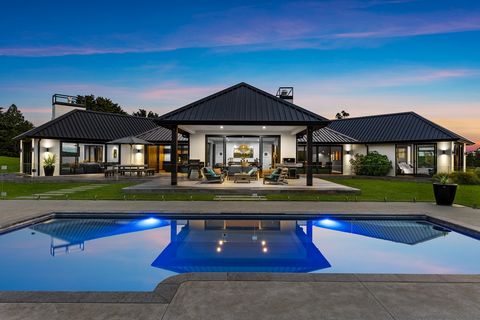 169 Tomarata Valley Road is a luxurious dream home situated on 88 acres, not too far from the city lights or East Coast beaches. The 467m2 build showcases sublime integration of finishing details with its rolling landscape, created with the help of O...