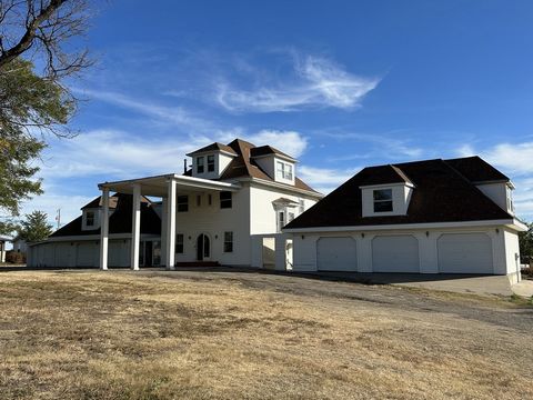 MOTIVATED SELLER!! This unique 2.3 acre property is located on the east side of Hays, Kansas just minutes from Hays Medical Center and Interstate 70. Although the property will require a lot of work and is in need of many repairs, it has a tremendous...