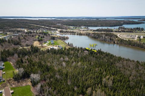 Cape Breton, River waterfront.  Looking for a great family spot to build? Building lot  with a 45m of river frontage. The river connects to the ocean which opens up all kinds of possibilities for fun on the water such as fishing, kayaking, or boating...