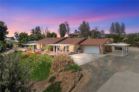 Welcome to beautiful Temecula’s Wine and Horse Country! This is a rare opportunity to own a single story horse property home with just under 5 acres. With its upgraded kitchen and bathrooms, the main residence offers 3 bedrooms and 2 bathrooms. The o...