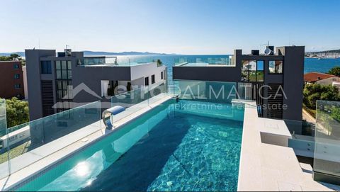 A luxury apartment with a pool on the roof terrace is for sale in Sukosan. This exclusive apartment is situated in a modern building located in the second row from the sea, offering the perfect blend of privacy and proximity to the coast. The apartme...