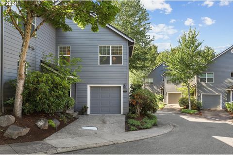 Lovely townhome in coveted Forest Heights. 1,091 Sq. Ft. 2 bedrooms, 1.5 bathrooms. This townhome features a great room floor plan with two story ceilings and new flooring throughout the main level. Living room with cozy wood burning fireplace and sl...