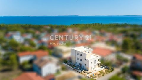 VIR, PEDINKA - Spacious three-room apartment in a new building - 600 m from the beach A three-room apartment for sale on the island of Vir, Pedinka district, with a total area of ​​68.82 m2. The apartment on the ground floor of the building consists ...