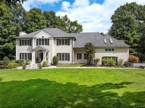 Stone pillars lead to this turnkey Colonial with a stunning, serene pool and spa setting & expansive yard. Sited on 2 supremely private, landscaped acres on a desirable, quiet street. Scrupulously maintained by original owner, this home has been upda...