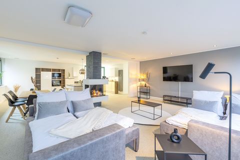 Welcome to the MILPAU Penthouse Apartment in Bochum-Wattenscheid! Our penthouse offers everything you need for a first-class stay: → 6 single beds, convertible into double beds → 2 box spring sofa beds (160x200 cm) → Gas fireplace → Exterior blinds w...