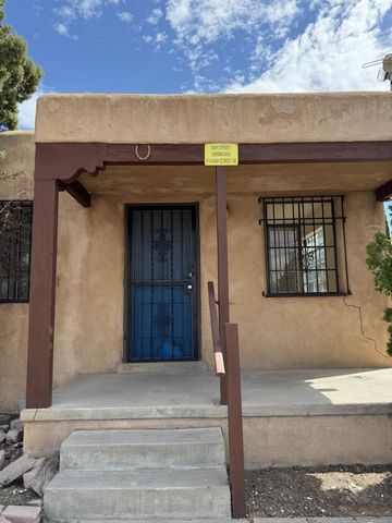 Great Investment Property Location- just a couple blocks from CNM. There are two 2 bedroom/1 bath units and one 1 bedroom/1 bath unit. The electric has been updated, and units are metered separately. The bathroom in unit 514 has been updated with new...