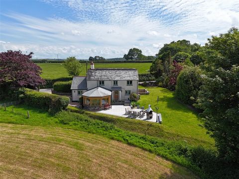 Set in the heart of the North Cornish countryside, this beautifully presented four-bedroom detached cottage offers the perfect blend of charm and contemporary living. With commanding 180° views over rolling fields, the property enjoys an enviable, pe...