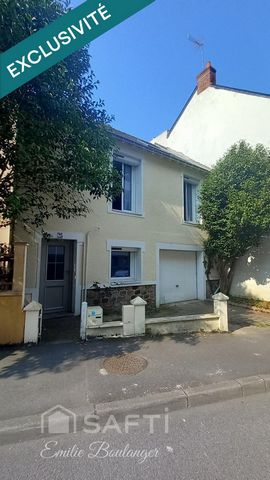 Maison de charme avec jardin, garage et véranda