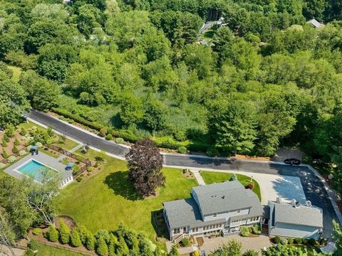 Surrounded by nearly 8 acres of uninterrupted natural beauty, this estate combines timeless design with modern luxury. From its stunning gunite pool and outdoor kitchen to the professionally landscaped grounds, every detail has been thoughtfully cura...