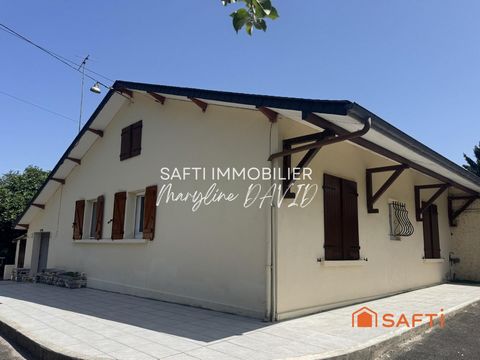 Maison de plain-pied de 100m², jardin et garages
