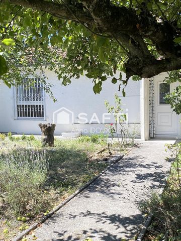 Maison de plain pied avec garage, cellier et grande véranda