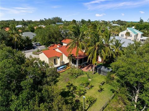 Extraordinary opportunity to own this breathtaking 1/3 acre property on the barrier island, nestled in a gated community where homes are valued at over $1 million! With plenty of room to build your dream pool or expand your living space. Deeded beach...