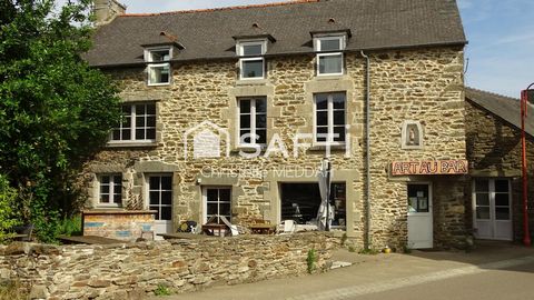 Maison de bourg en pierre, et son local commercial