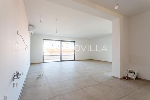 Vodice, Srima, spacious apartment on the first floor with a balcony, Net Usable Area 123.59 m². The apartment is located in a modern building with a total of 4 apartments. It has a garage on the ground floor. The terrace area is 16.42 m², and the clo...