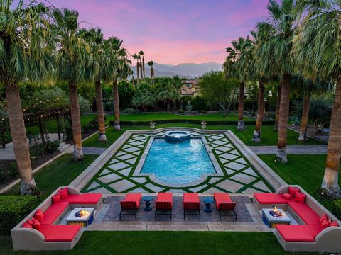 Imagine entering through a majestic, gated entry lined with towering Palm Trees to an extraordinary Estate that exudes unparalled luxury and exquisite style. This Elegant Spanish residence is known as Casa Del Sueno or Dream House, a tranquil luxury ...