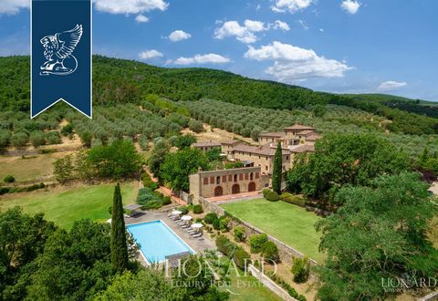Located in one of Chianti's most prestigious areas, this small, 16th-century hamlet for sale also includes a luxurious agritourism resort and is surrounded by 2 hectares of grounds. Currently intended as a charming accommodation facility, this e...