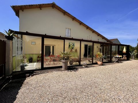 Situated in a pretty riverside village just 5 minutes from the market town of Ruffec, this pretty stone property is comprised of a large conservatory which doubles up as a summer dining room, a good-sized kitchen, a lovely lounge-diner of 34m² with i...