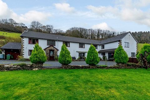 Neuadd Wen is a substantial 10-bedroom residence, currently serving as a guest house, that spans over 4,000 square feet. The property offers the flexibility to adapt for multi-generational living or to generate additional income. Pre-planning permiss...