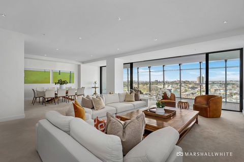 Lavishly proportioned and luxuriously finished with breathtaking panoramic views from the 12th floor, this magnificent residence within the renowned Lucient development is a statement in high-end St Kilda Road living. Extraordinary in scale, the impe...