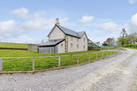 Located between converted barns and in an elevated position overlooking the magnificent Monmouthshire countryside sits The Farmhouse at Clawdd-y-Parc close to the village of Llangybi. This beautiful, fully refurbished home has been thoughtfully resto...