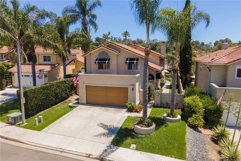 Welcome to your dream home in the prestigious Rancho Niguel community! This stunning residence offers a perfect blend of modern luxury and comfortable living. Upon entering, you'll be greeted by elegant travertine flooring that extends throughout the...