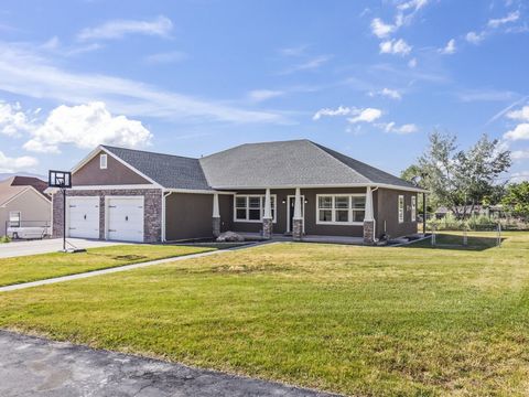 This spacious rambler in the heart of Manti is a MUST SEE! The home boasts 4576 square feet with a fully finished basement and sits on 0.36 acres with 0.33 shares of irrigation water. There are 6 bedrooms with the primary suite on the main level, 3 f...