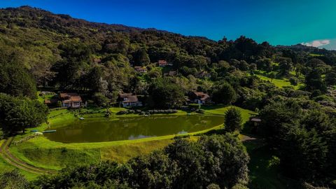 Experience the epitome of luxury living in the serene mountains of Barva de Heredia with this enchanting three-bedroom, two-and-a-half-bath home. Nestled in the Montelagos Community, this Alpine-inspired retreat offers nature lovers a perfect blend o...