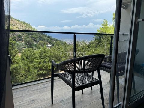 Middle-Floor Flat with Balcony within the Complex in Fethiye The flat for sale is located in the Kesikkapı Neighborhood of Taşkaya in Fethiye. Taşkaya is a popular area in Fethiye, Muğla, known for its vibrant yet tranquil environment. The neighborho...