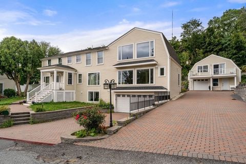Nestled in a serene location across from conservation land & a peaceful river, this beautifully renovated home offers both luxury and comfort. Designed with versatility in mind, it has a layout reminiscent of a side-by-side duplex, ideal for multigen...