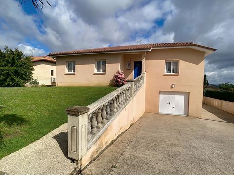 Maison individuelle avec garage et jardin clôturé