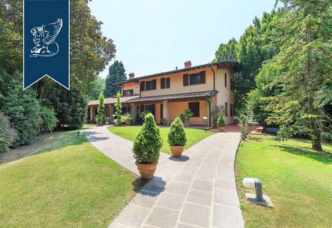 In the province of Bergamo this recently-renovated luxury estate is for sale. The park that houses the villa extends for 1,1 ha, and graceful bridge connects the land owned, crossed by a small river that feeds a spectacular fountain with games of lig...