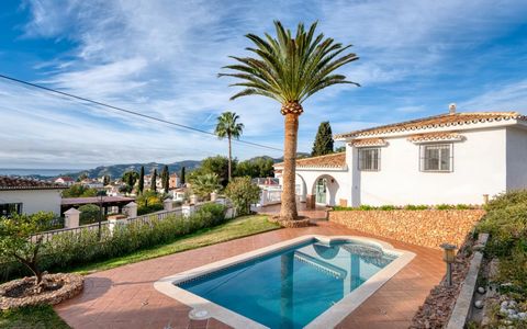 Lovely villa with private pool and large garden situated in the sought-after residential area of Cortijo San Rafael on the road from Nerja to Frigiliana. Designed over two floors plus a garage. The ground floor is distributed into a fully fitted kitc...