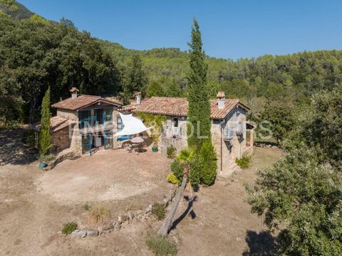 This exceptional property is located in a stunning natural setting, which is accessed via a dirt road that winds through a lush forest. From a spacious and sunny south-facing terrace, you enter through a glass front, leading to a charming old kitchen...