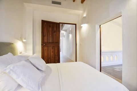 This impressive house, a former 19th century convent, was recently renovated with great attention to detail. It was converted into a luxurious villa for an unforgettable holiday in Mallorca. With almost 500 m² of living space spread over three huge a...