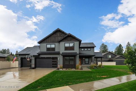 Step into this exceptional custom-built Alpine Point home, nestled in a serene neighborhood just moments from Canfield Mountain, the Canfield Trail System, Shadduck Park, and stunning forest access! Priced well below its appraised value, this is a ra...