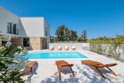 Location: Zadarska županija, Nin, Grbe. FOR SALE villa with pool in Nin, which exudes an oasis of luxury and elegance - built in 2023, represents a combination of modern design and first-class facilities. Located in a peaceful environment, this villa...