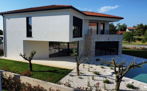 Beschrijving Deze stijlvolle villa in moderne architectuur is gelegen op een rustige locatie in de buurt van Poreč en combineert de hoogste bouwkwaliteit met luxueus wooncomfort. De villa is verdeeld over twee verdiepingen en wordt gebouwd volgens de...